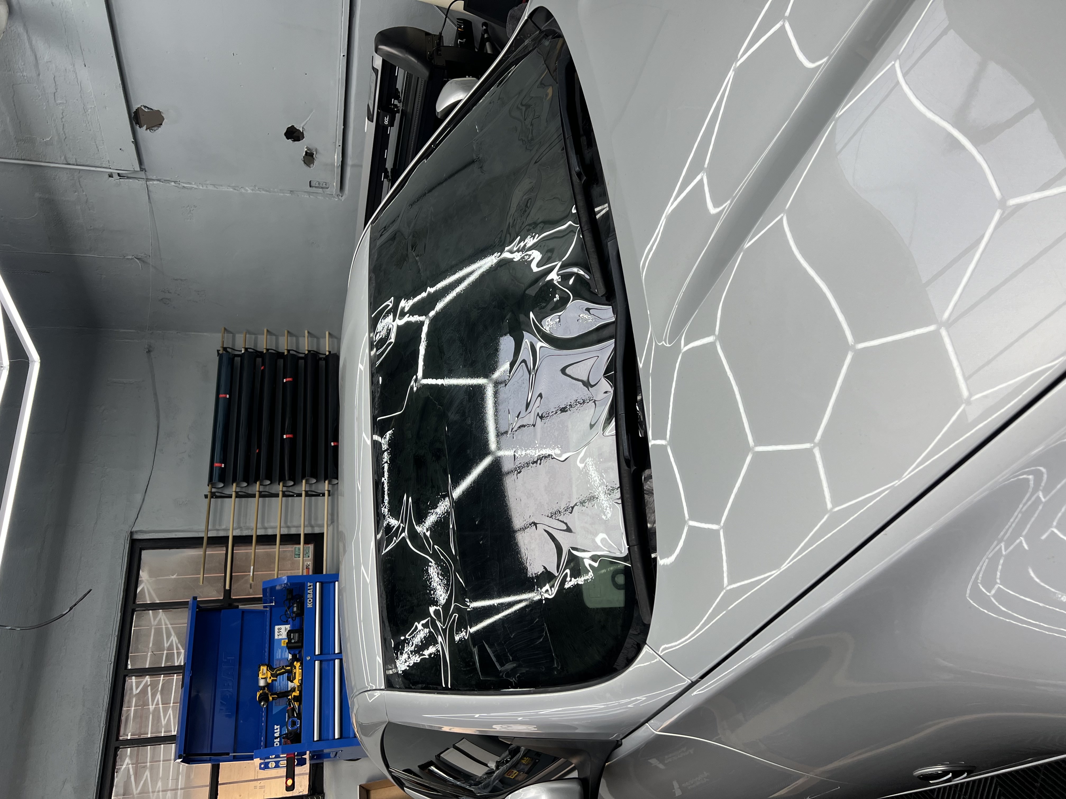 Black SUV in studio lighting