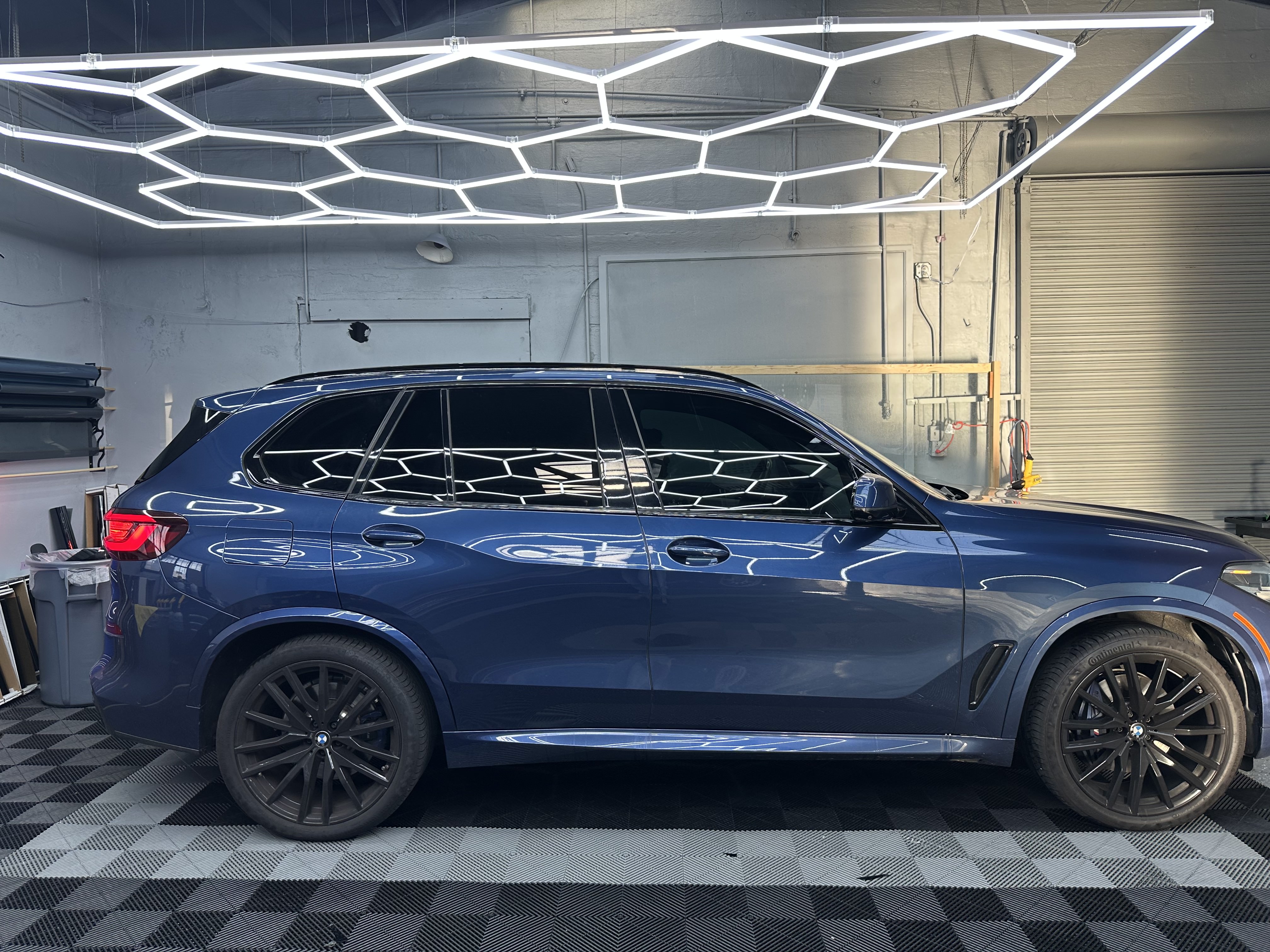 Truck in front of mural wall